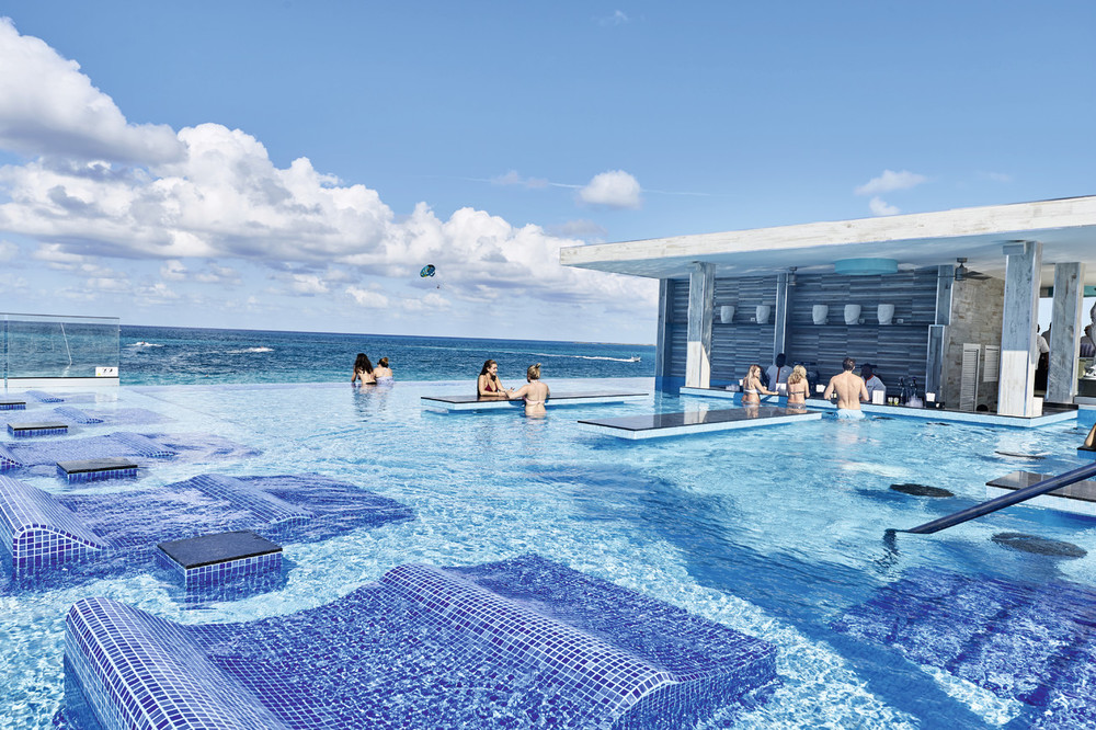 Infinity pool with swim up bar at Riu Palace Paradise Island