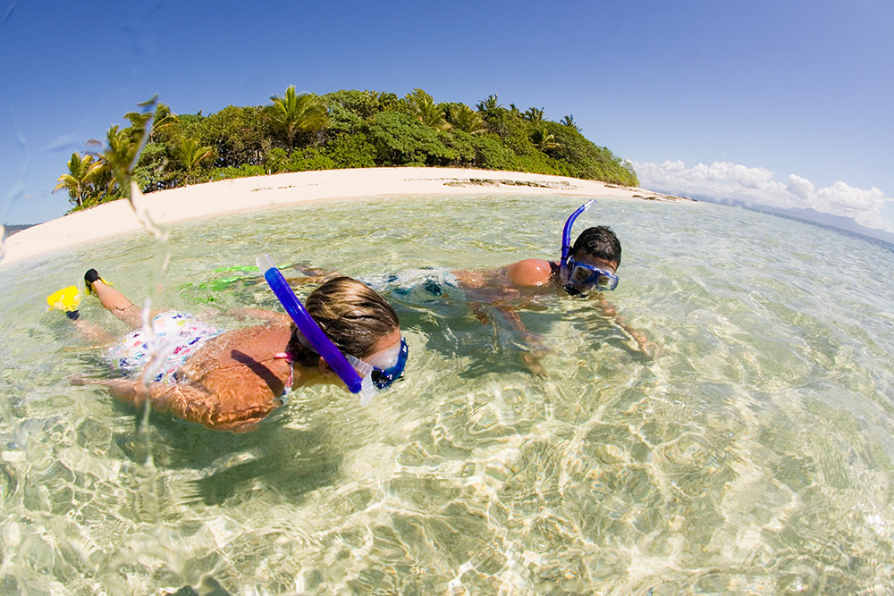 couple snorkeling in the Caribbean