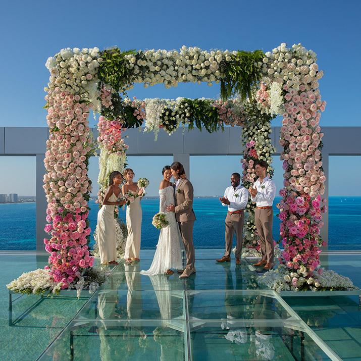 Beachfront wedding ceremony at Breathless Cancun Soul Resort & Spa