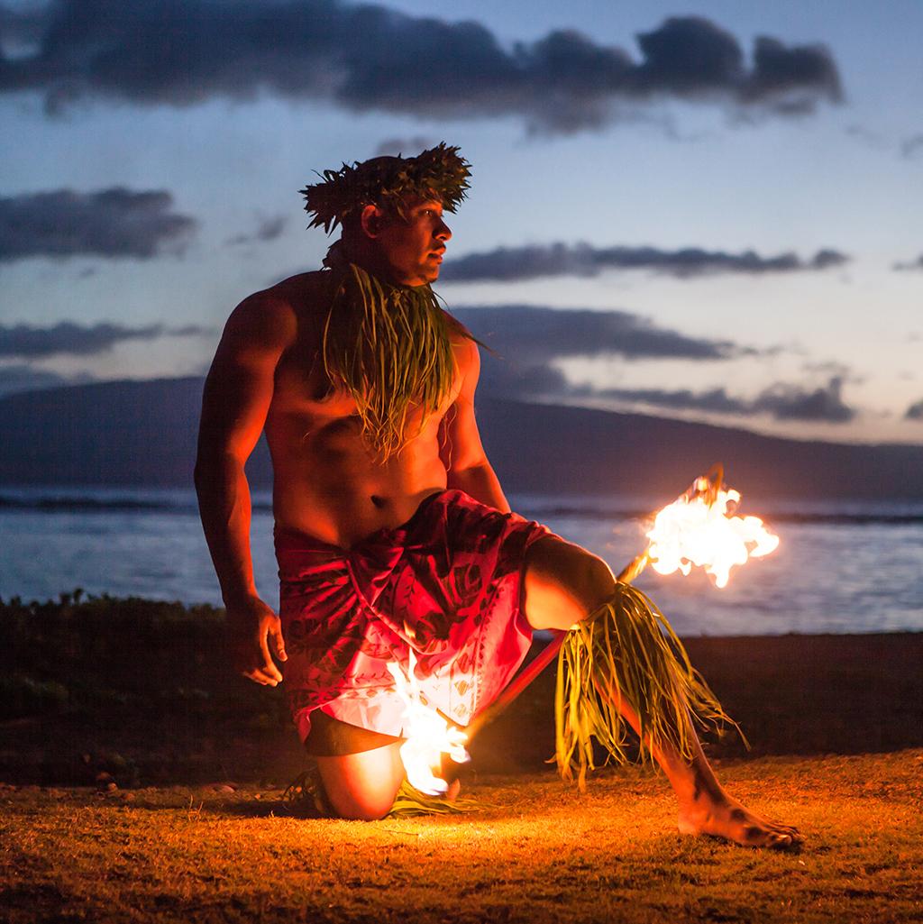Native Hawaiian fire dancer in Kauai