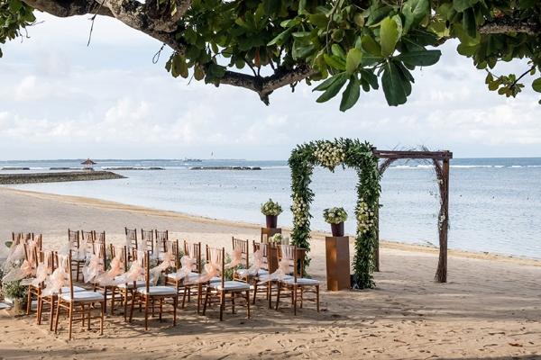 Destination wedding ceremony setup on a beach