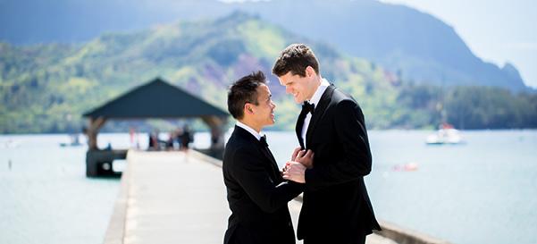 A couple of grooms enjoy their destination wedding
