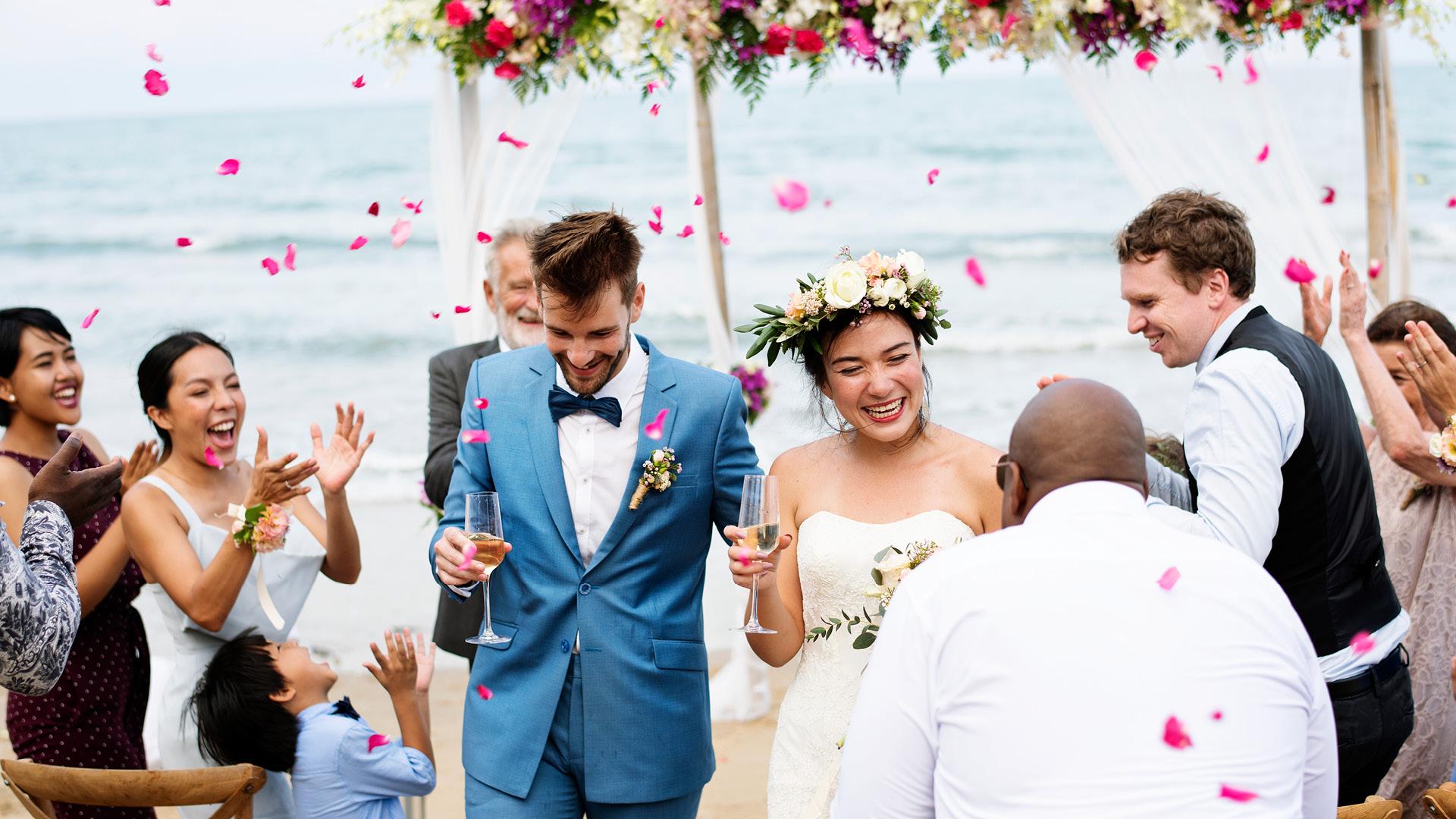 Wedding couple walking down aisle after saying "I do"