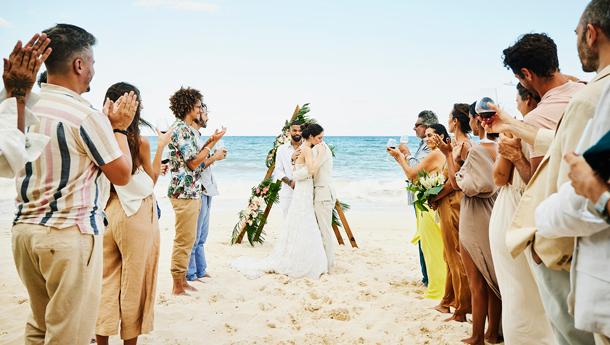 A couple gets married on the beach