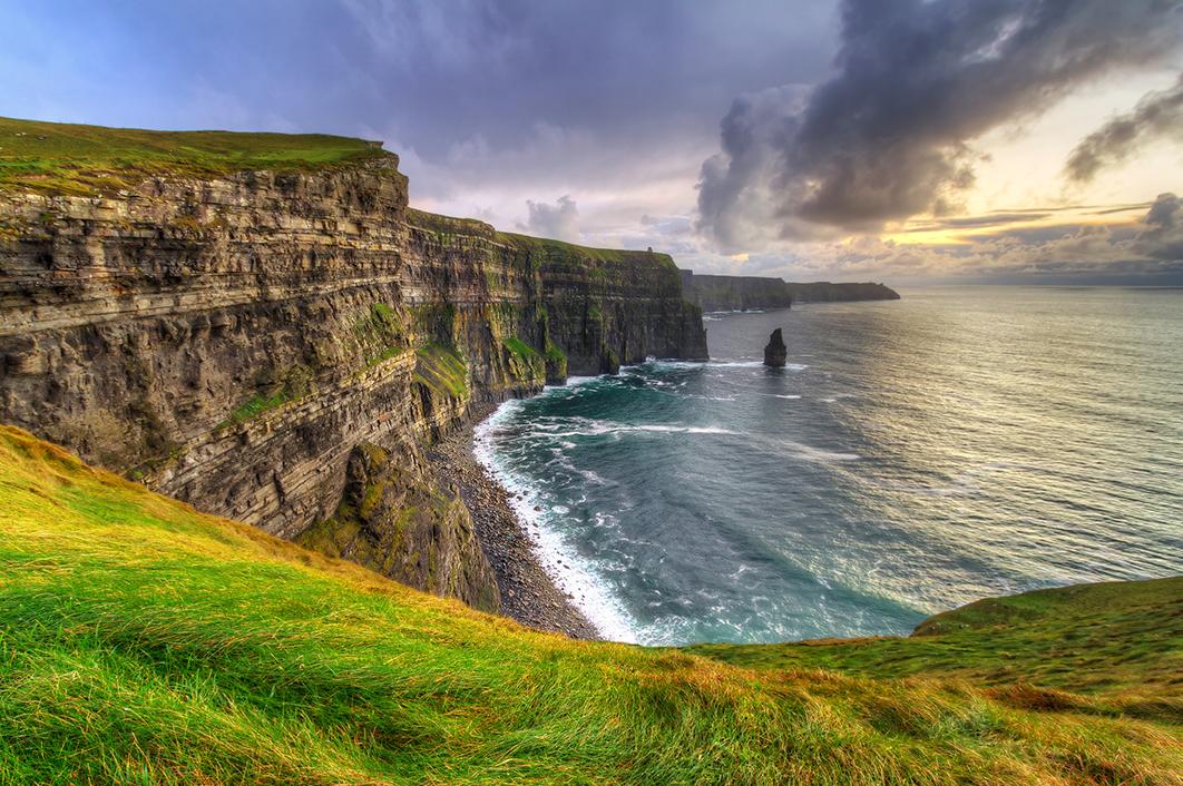 Ireland’s green cliffs meeting the blue ocean in Limerick