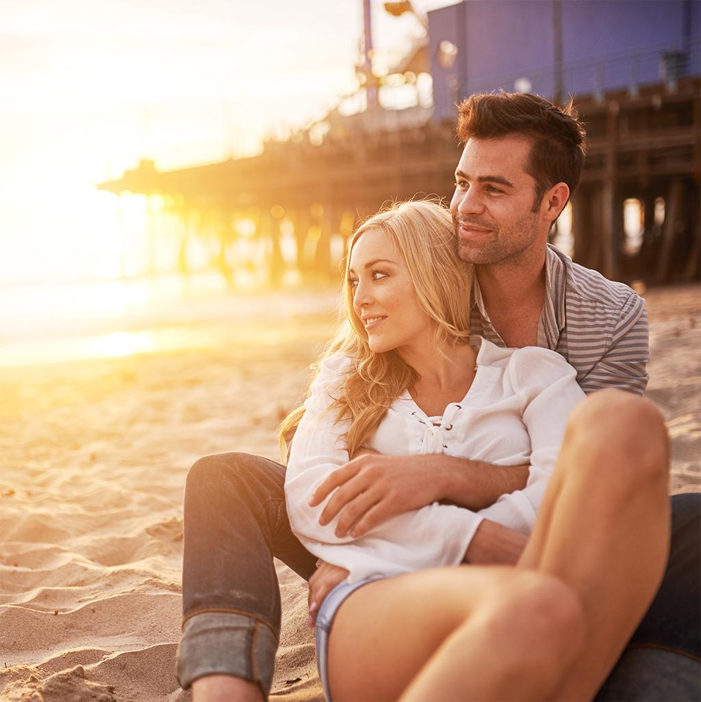 Couple relaxing on the beach in Los Angeles