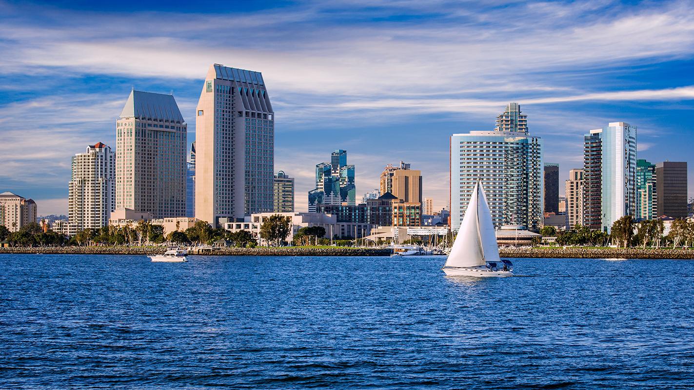 sailboats drifting in the waters overlooking San Diego