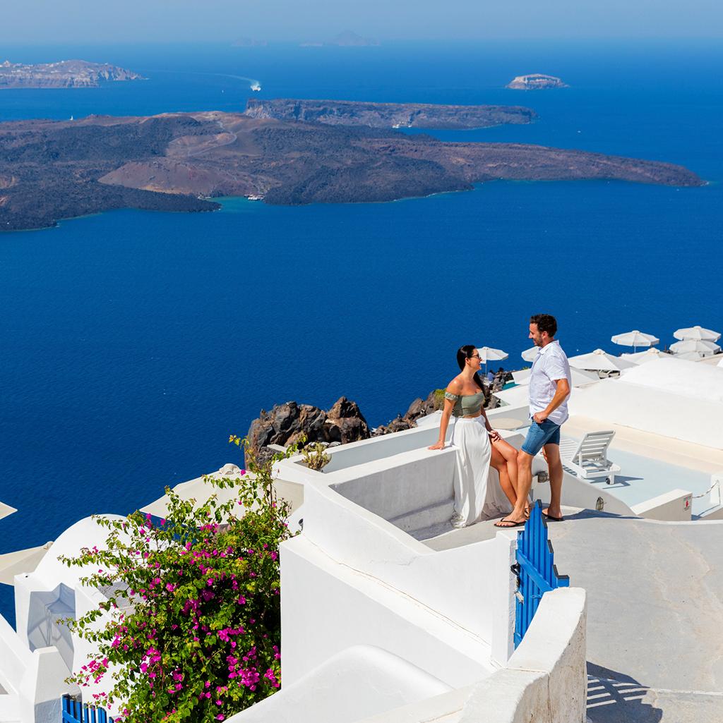 Couple on a Topdeck Tour in Santorini Greece