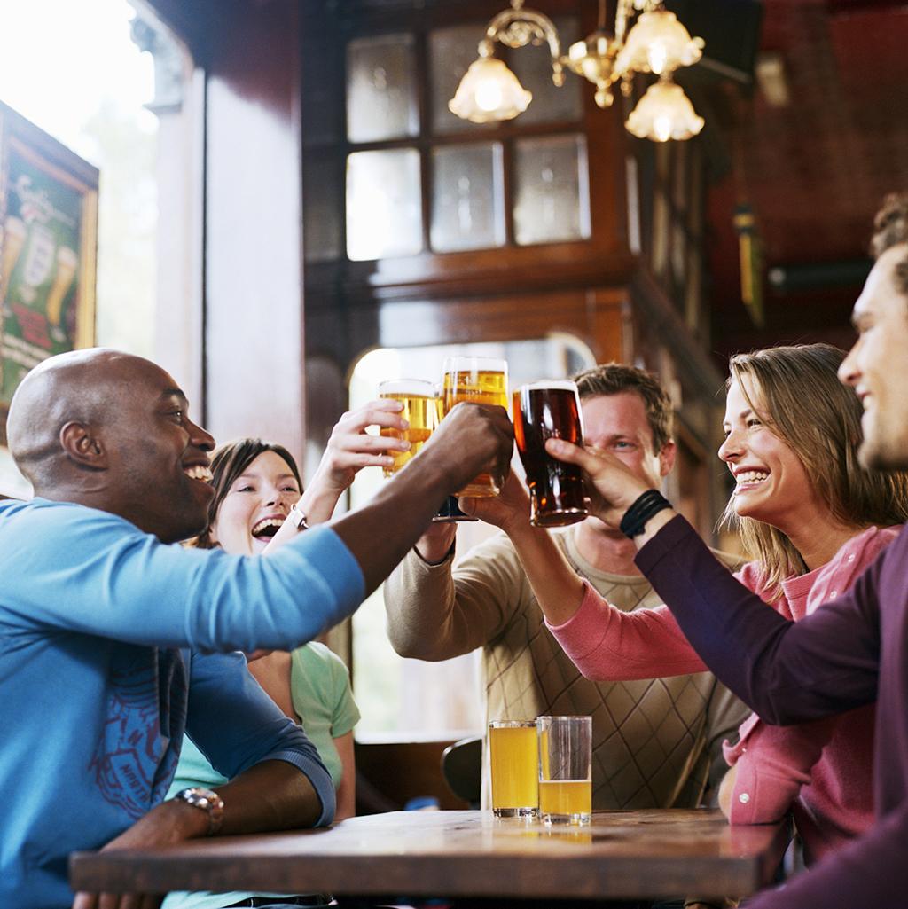Share a pint with friends in the United Kingdom’s famous pub scene
