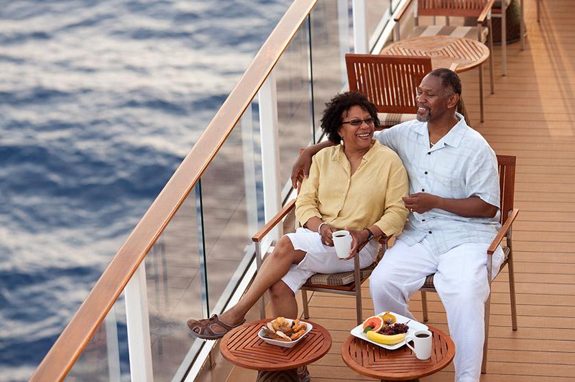 A couple relaxes on a cruise