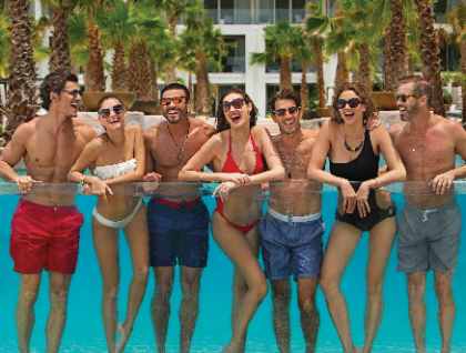 Group of friends in the pool at a Caribbean resort