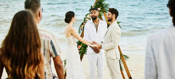 A couple gets married on the beach