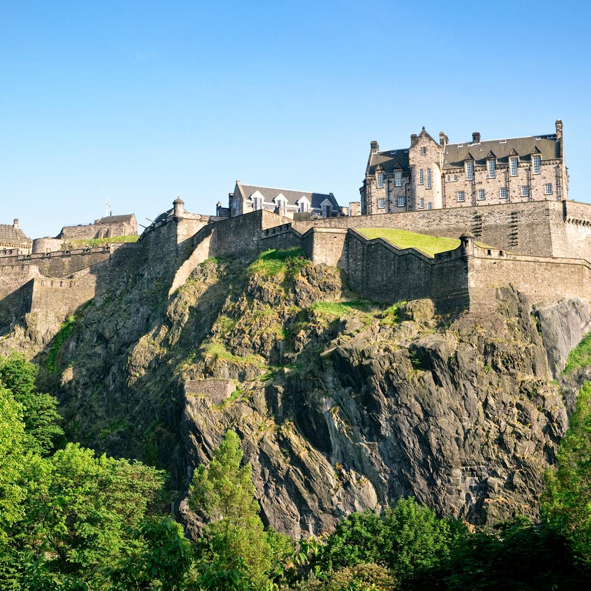 Views of cliffside castles and palaces in Edinburgh Scotland