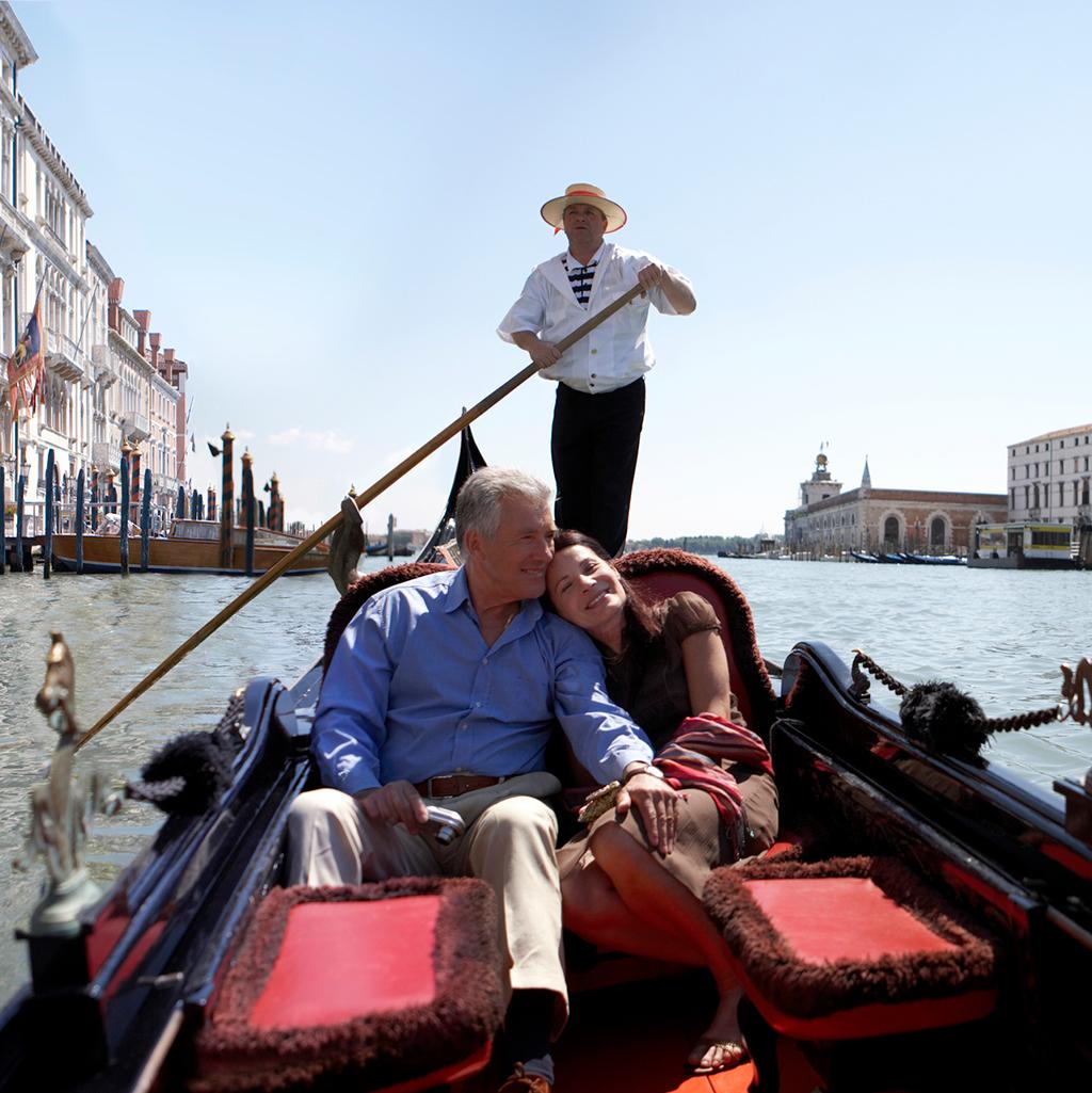 traditional gondola ride through the canals of Venice
