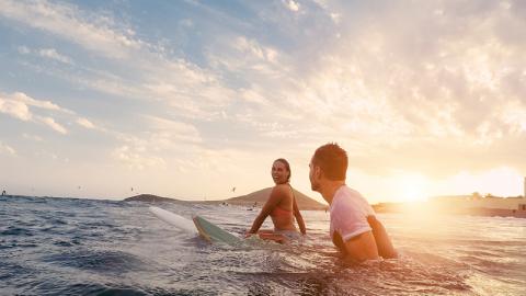 Surfing couple